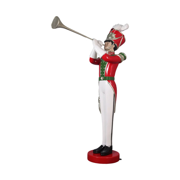 Heinimex Art Deco Toy Soldier with Trumpet Christmas decor, high-gloss vibrant holiday painted finish, stylized Art Deco aesthetic angle view