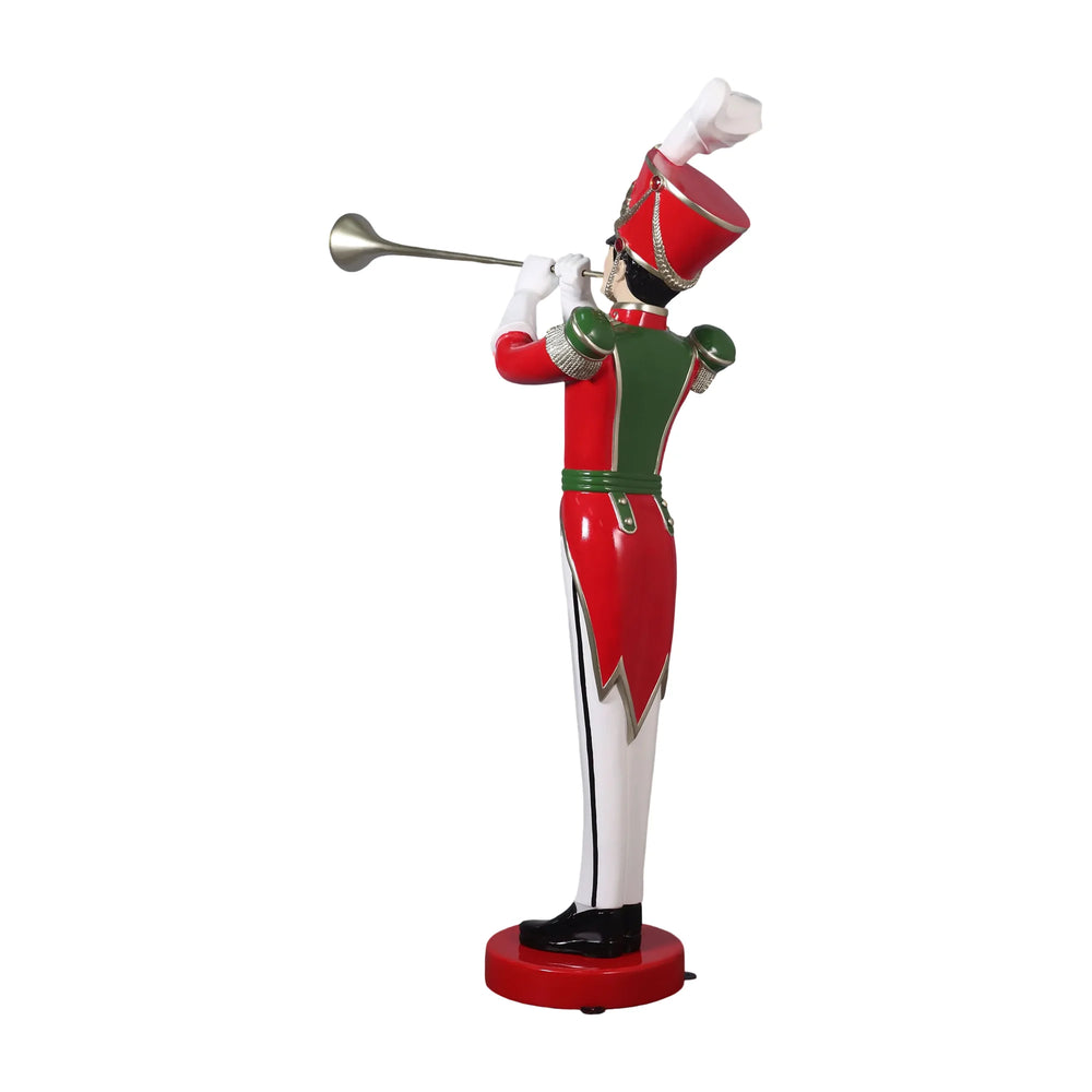 Heinimex Art Deco Toy Soldier with Trumpet Christmas decor, high-gloss vibrant holiday painted finish, stylized Art Deco aesthetic angle view