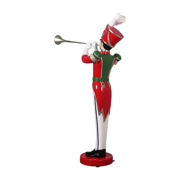 Heinimex Art Deco Toy Soldier with Trumpet Christmas decor, high-gloss vibrant holiday painted finish, stylized Art Deco aesthetic angle back view