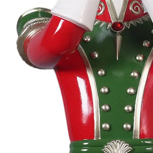 Heinimex Art Deco Toy Soldier with Trumpet Christmas decor, high-gloss vibrant holiday painted finish, stylized Art Deco aesthetic close up detail