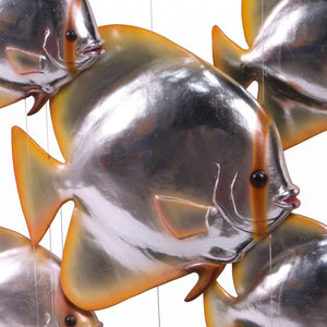 Heinimex Batfish Console indoor furniture, matte black frame with metallic silver fish, modern luxury coastal style close up view