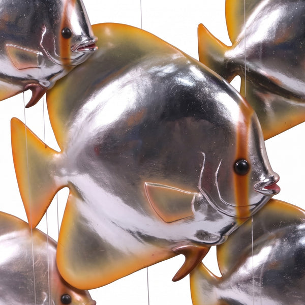 Heinimex Batfish Console indoor furniture, matte black frame with metallic silver fish, modern luxury coastal style close up view
