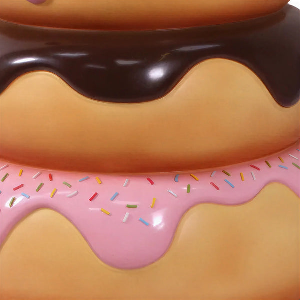15-inch pink frosted donut wall decor with colorful sprinkles, commercial retail display prop by Heinimex in detail view