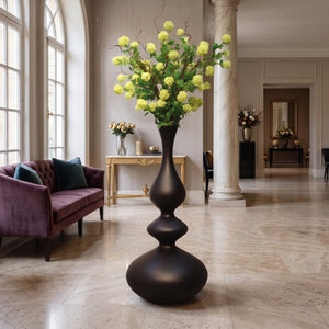 Heinimex Flora Eleganza vase, smooth matte black finish, modern luxury minimalist lifestyle photo