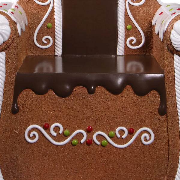 Heinimex Gingerbread Throne Christmas decor, textured gingerbread and glossy chocolate finish with painted icing, playful holiday close up view