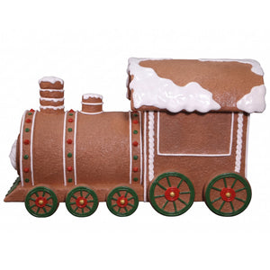 Heinimex Gingerbread Train Christmas decor, textured gingerbread and painted icing finish with snow accents, playful holiday display side view
