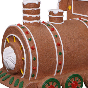 Heinimex Gingerbread Train Christmas decor, textured gingerbread and painted icing finish with snow accents, playful holiday display closeup detail