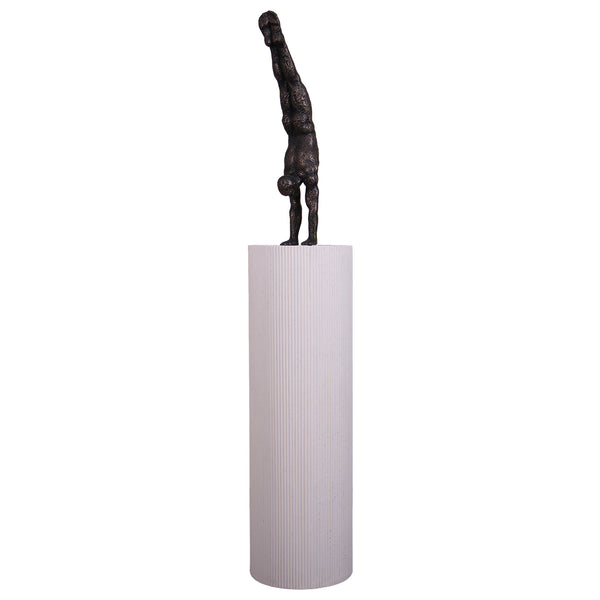 Heinimex Gymnast on Groovy Pedestal sculpture, textured Imperial Bronze finish on matte white, modern luxury gallery style angle view