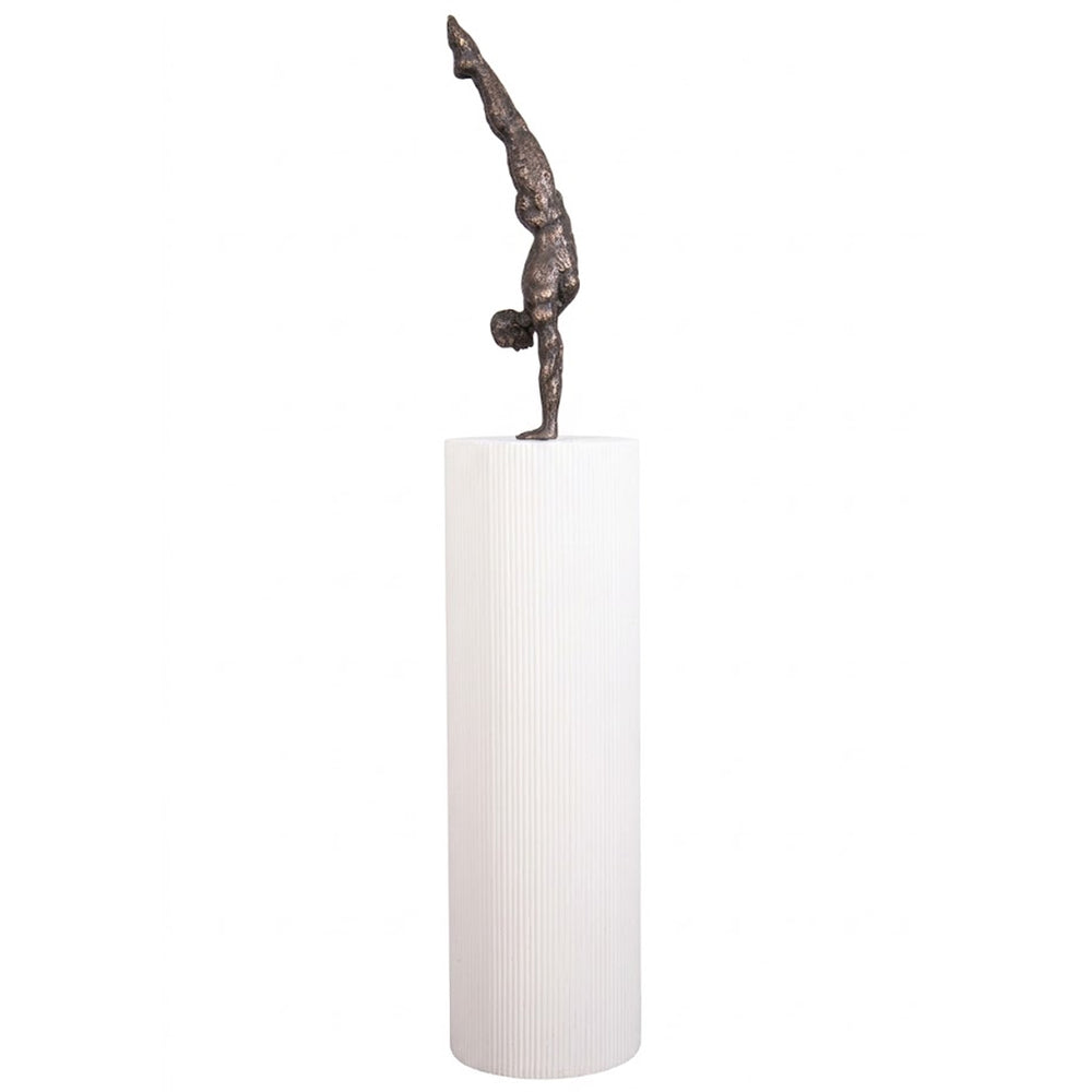 Heinimex Gymnast on Groovy Pedestal sculpture, textured Imperial Bronze finish on matte white, modern luxury gallery style angle view