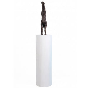 Heinimex Gymnast on Groovy Pedestal sculpture, textured Imperial Bronze finish on matte white, modern luxury gallery style front view