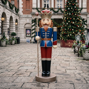 Heinimex Majestic Nutcracker 6.5ft Christmas decor, glossy painted finish with metallic gold and jewel-tone accents, classic regal holiday display lifestyle photo