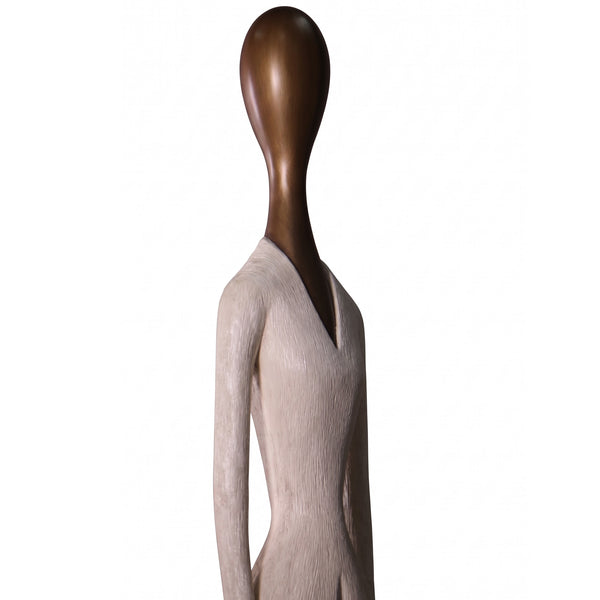 Heinimex 80-inch Paya elongated human figure statues, textured stone-look and smooth wood-tone finish, modern minimalist gallery style close up detail