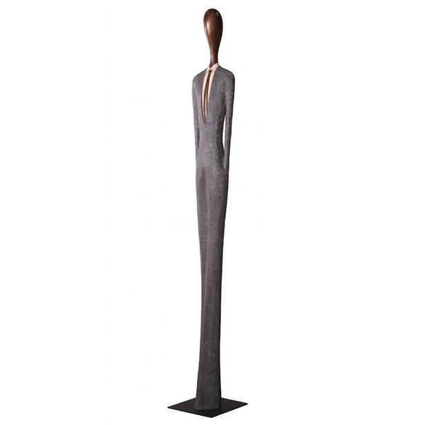 Heinimex 85-inch Payo elongated human figure statues, textured stone-look and smooth wood-tone finish, modern minimalist gallery style angle view