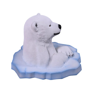 Heinimex Peeking Polar Bear Cub animal figure, textured faux-fur and sculpted ice finish, playful winter holiday display style side view