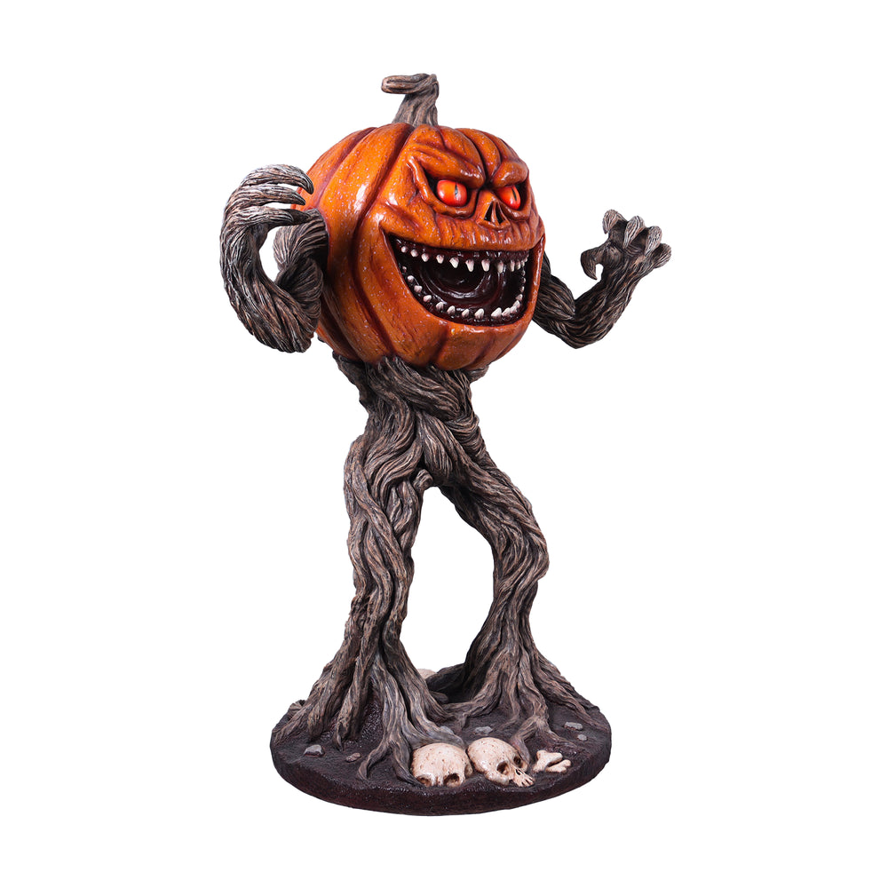 Heinimex Pumpkin Monster 5ft Halloween decor, realistic textured orange pumpkin with gnarled twisted root body and skull base, eerie outdoor haunted patch display style anggle view