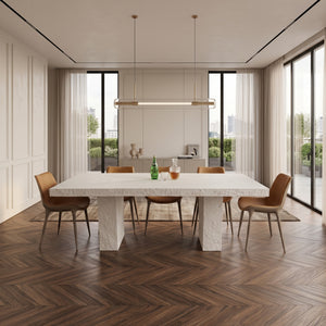 Heinimex Robusto Dining Table - 84" x 40" x 30"H, textured white stone-look finish, modern minimalist luxury life style photo.