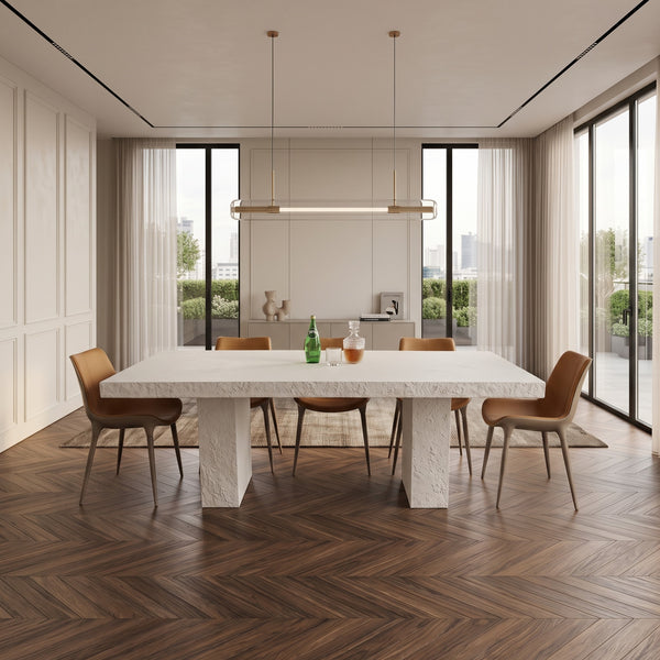 Heinimex Robusto Dining Table - 84" x 40" x 30"H, textured white stone-look finish, modern minimalist luxury life style photo.