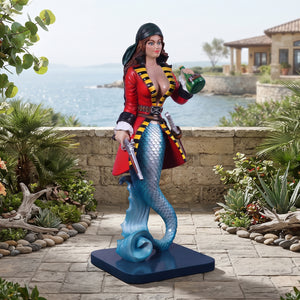 Heinimex Sassea The Mermaid Pirate statue, vibrant hand-painted finish with metallic scaled tail, playful coastal fantasy display lifestyle photo.