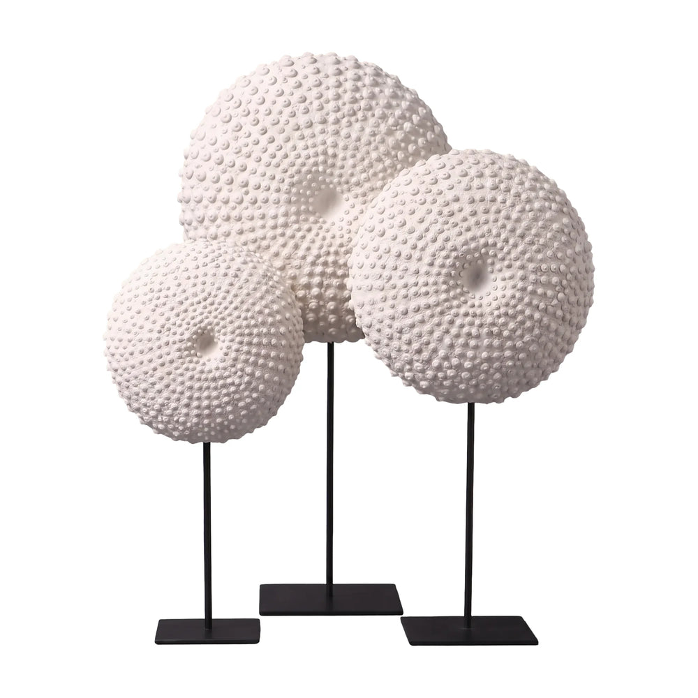 Heinimex Sea Urchin on Stand centerpiece, textured white stone finish with black metal stand, modern coastal luxury style 16 inches in front view