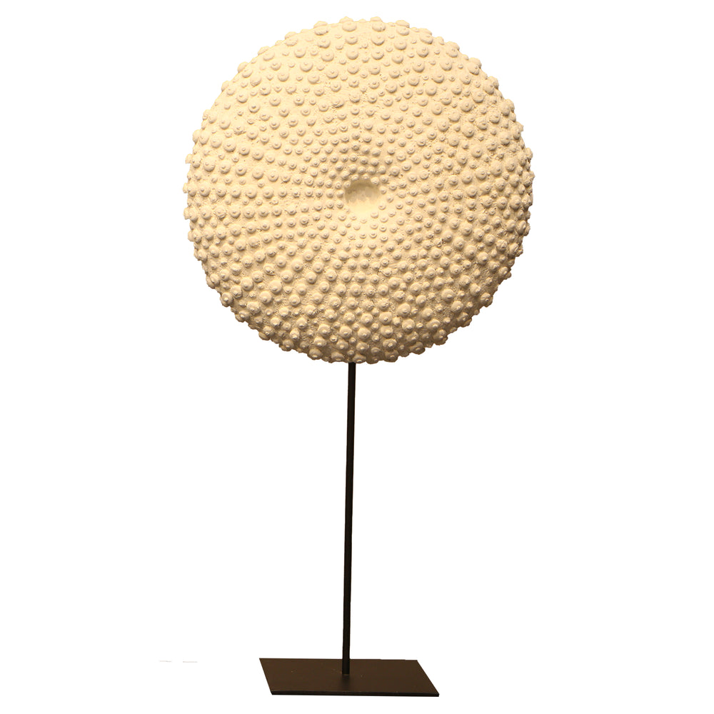 Heinimex Sea Urchin on Stand centerpiece, textured white stone finish with black metal stand, modern coastal luxury style 24 inches on stand front view