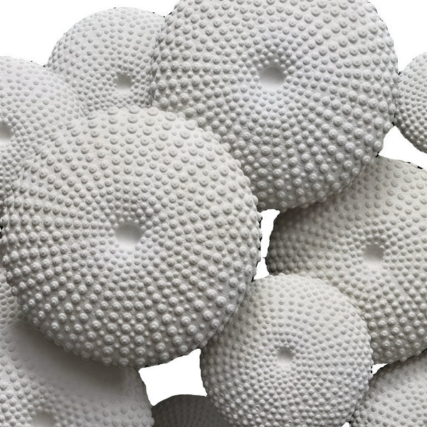Heinimex Sea Urchin Wall Decor, textured white stone finish, modern coastal luxury style close up detail