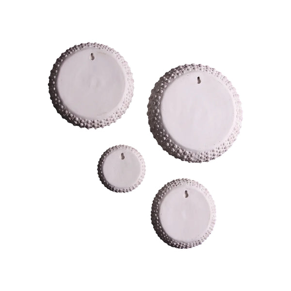 Heinimex Sea Urchins Wall Art - Set of 4 wall decor, textured white stone finish, modern coastal luxury style back view