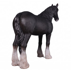Heinimex Shire Horse statue, realistic matte black finish with textured white feathered hooves, rustic equestrian ranch display style back angle view
