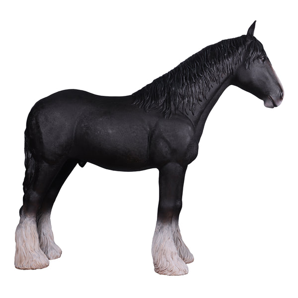 Heinimex Shire Horse statue, realistic matte black finish with textured white feathered hooves, rustic equestrian ranch display style left side view