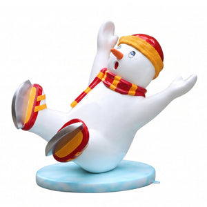 Heinimex Skating Snowman Family Boy Christmas decor, glossy painted finish with vibrant red and yellow accents, playful winter wonderland display style angle view