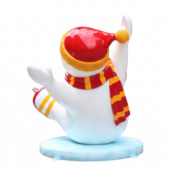 Heinimex Skating Snowman Family Boy Christmas decor, glossy painted finish with vibrant red and yellow accents, playful winter wonderland display style back view
