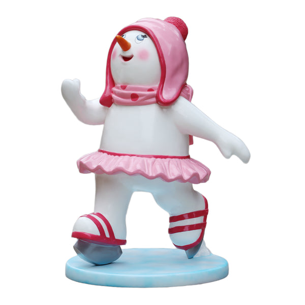 Heinimex Skating Snowman Family - Girl Christmas decor, glossy painted finish with pink accents and tutu, playful winter wonderland display style angle view