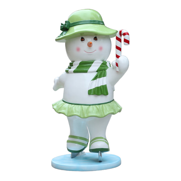 Heinimex Skating Snowman Family - Mother Christmas decor, glossy painted finish with green accents and candy cane, playful winter wonderland display style front view