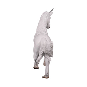Decorative statue of a small white unicorn featuring a sculpted mane, a spiraled horn, and a gentle prancing pose.