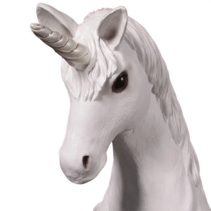 Decorative statue of a small white unicorn featuring a sculpted mane, a spiraled horn, and a gentle prancing pose.