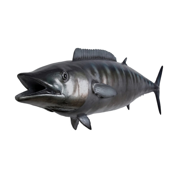 Decorative sculpture of a Wahoo fish featuring a streamlined body, a metallic silver finish, and dark vertical stripes along its back.