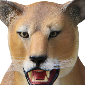 Decorative statue of a walking lioness featuring a textured tan coat, a lighter underbelly, and an open mouth with visible teeth.