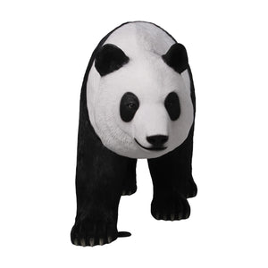 Decorative statue of a walking giant panda featuring a realistic black and white textured coat.