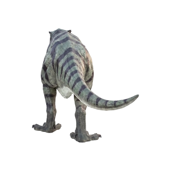 Decorative statue of a walking Tyrannosaurus Rex featuring greyish-green skin with dark stripes, a pale underbelly, and an open roaring mouth.