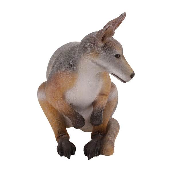 Decorative statue of a crouching wallaby featuring a grey and tan coat, upright ears, and a thick tail resting on the ground.