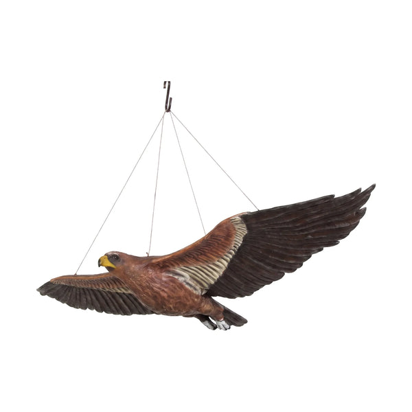 Decorative hanging sculpture of a wedge-tailed eagle in flight, featuring textured brown feathers, a wide wingspan, and a bright yellow beak.
