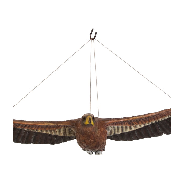 Decorative hanging sculpture of a wedge-tailed eagle in flight, featuring textured brown feathers, a wide wingspan, and a bright yellow beak.