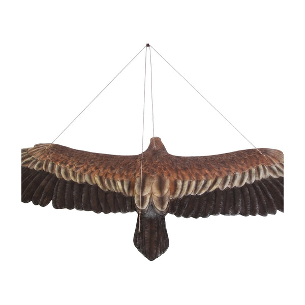 Decorative hanging sculpture of a wedge-tailed eagle in flight, featuring textured brown feathers, a wide wingspan, and a bright yellow beak.