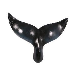 Decorative wall-mounted whale tail sculpture featuring a glossy dark blue and black finish with textured edges.