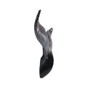 Decorative wall-mounted whale tail sculpture featuring a glossy dark blue and black finish with textured edges.