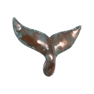 Decorative wall-mounted whale tail sculpture featuring a metallic copper finish with green patina accents.