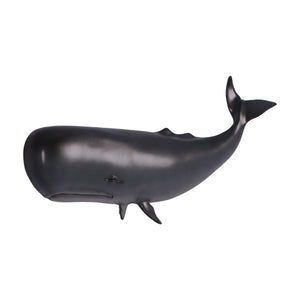 Decorative wall-mounted sculpture of a dark grey sperm whale featuring a prominent blunt head and a raised, curved tail.