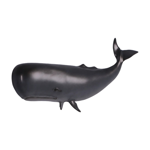 Decorative wall-mounted sculpture of a dark grey sperm whale featuring a prominent blunt head and a raised, curved tail.