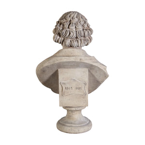 Decorative light grey stone-like bust of William Shakespeare featuring detailed facial features, draped clothing, and a pedestal base.
