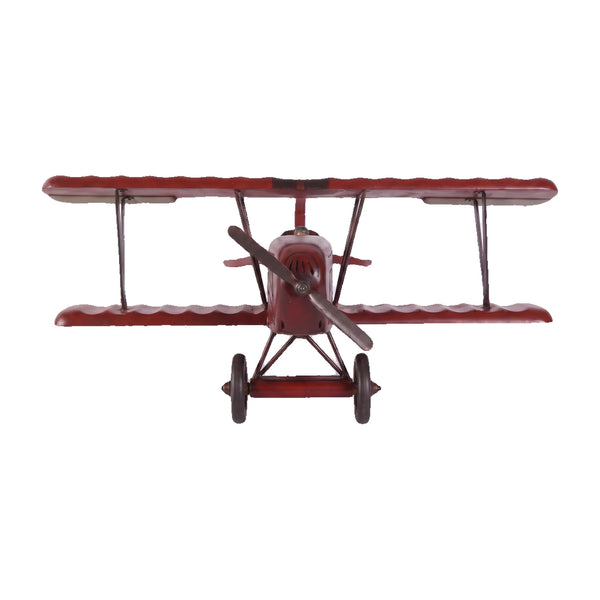Decorative wooden biplane model featuring a dark red finish, spoked wheels, and a small pilot figure.