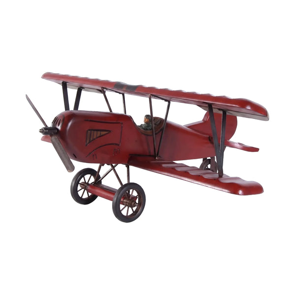 Decorative wooden biplane model featuring a dark red finish, spoked wheels, and a small pilot figure.